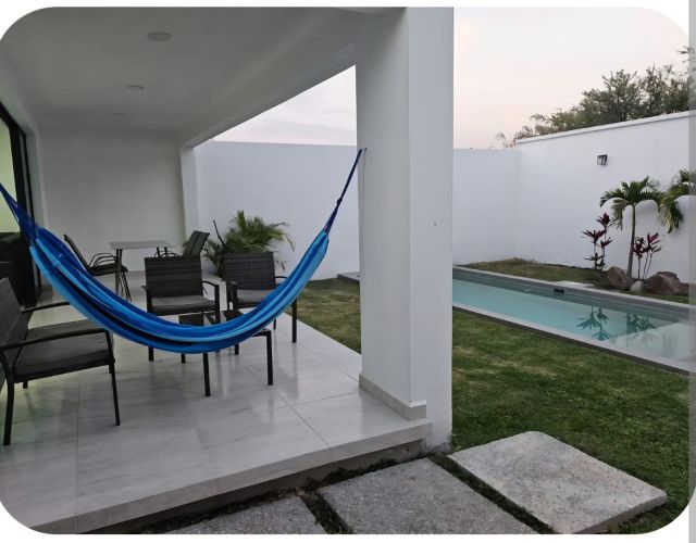 {"esp":"Terraza con Asador portatil para su comodidad","ing":""}