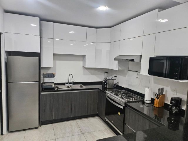 {"esp":"Cocina Equipada","ing":""}