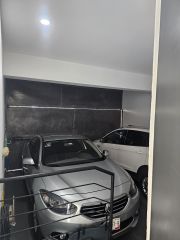 {"esp":"Garaje cubierto para  2 autos","ing":""}