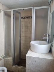 {"esp":"Ba\u00f1o completo en Planta Baja","ing":""}