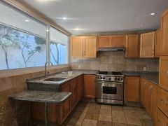 {"esp":"Cocina Equipada","ing":""}