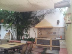 {"esp":"Terraza con Asador","ing":""}