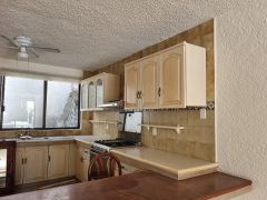 {"esp":"cocina equipada","ing":""}