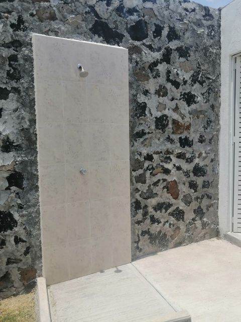 {"esp":"REGADERA EN \u00c1REA DE ALBERCA","ing":""}